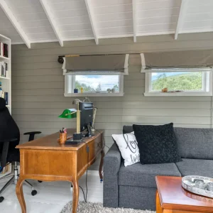 Annex, living room, lovely workplace with large desk and own PC screen. You get a fantastic view of the sea / lake when you sit and work.